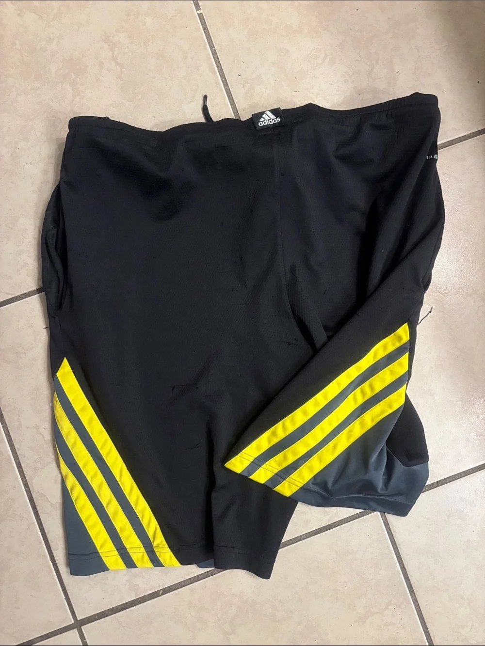 Adidas Black Athletic Shorts with Yellow Stripes